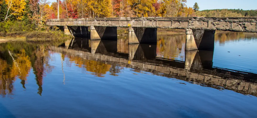 bridge in michigamme township in fall